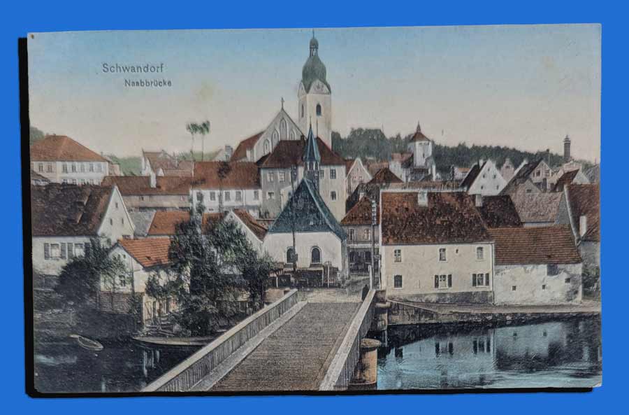 Historische Ansichtskarte von Schwandorf in der Oberpfalz mit Naabbrücke, Altstadt, Kirche und Häusern am Fluss. Vergleich mit SEO GEO  von früher
